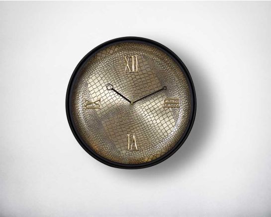 Round wall clock in croc etched design with a matt antique brass finish in black polish with roman numerals in rich contemporary design.