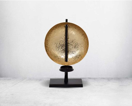 This retro-modern candle/pillar holder is crafted in antique brass with the candle holder in matt black adding a timeless mood to any space.