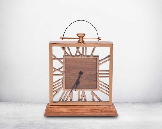 Square table clock in rose gold and wood in natural polish with front view roman numerals.