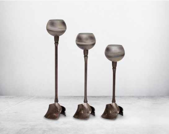 Pillar goblet candle holder in grey color and burnt glaze luster glass with nickel-plated textured aluminum decorative base.