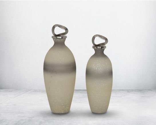 Decorative bottle in grey & white tinted luster glass with ornamental nickel plated aluminum lid. 1 bottle large 2 bottle small