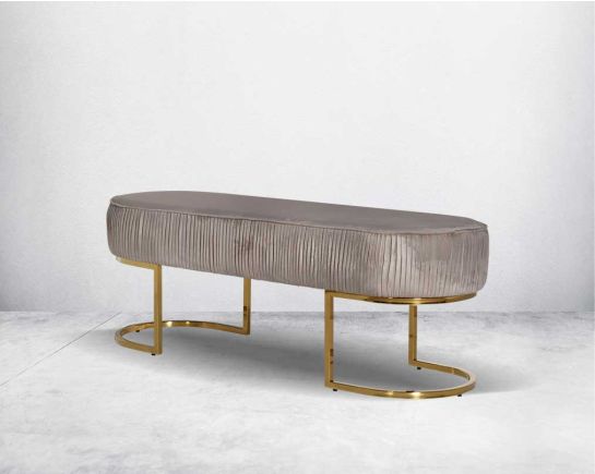 Double bench upholstered with tufted fabric seat and high polished gold plated stainless steel legs in classic design.