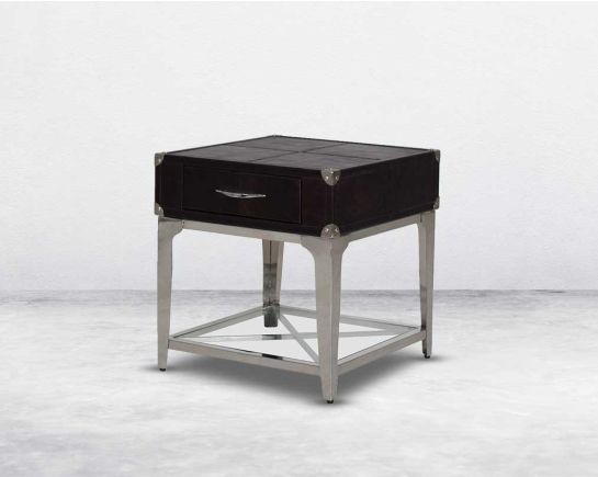 "Rectangular end table with vintage brown luxurious leather with one drawer & glass shelf with stainless steel frame & legs in modern design. "