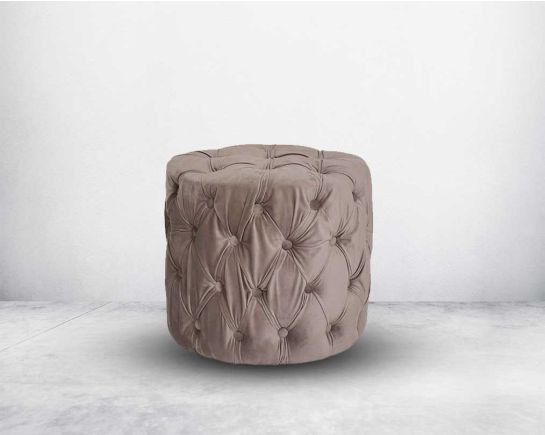 Ottoman upholstered in velvet fabric fully tufted which offers a contemporary glamorous touch highlighting your decor space.