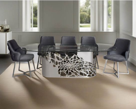 This exquisite & beautiful dining table with an artistic laser cut base in glossy stainless steel this soft, cushioned dining chair features an extraordinary contemporary design with tufted back and cushioned seat with stainless steel legs