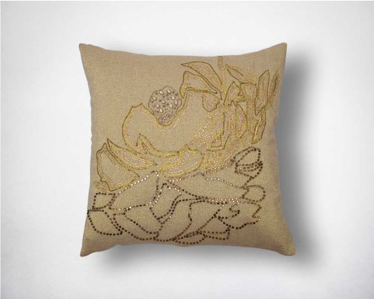 Biege cotton embroidered cushion.