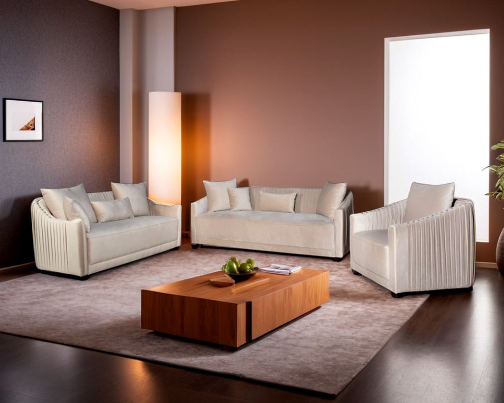 This 3+2+1 sofa is a sensory experience of luxurious relaxation and esoteric design. With a curvilinear silhouette, it features rich fabric upholstery on wooden frame conjuring the right sensations of comfort and inevitable luxury.